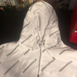 a Half crop top hoodie. Has the logo Aeropostale on it a lot